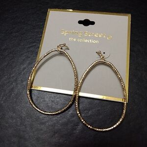 Spring Street gold tone oval dangling earrings